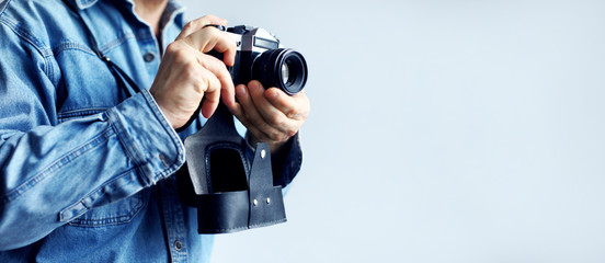 Image of reporter with film camera
