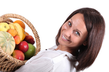 woman holding a fruits basket