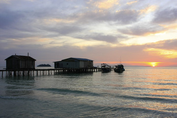 Obraz premium Silhouette of wooden jetty at sunrise, Koh Rong island, Cambodia