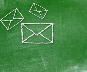 School blackboard and mail symbol