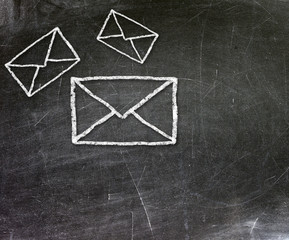School blackboard and mail symbol