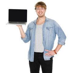 Young man student showing blank laptop screen