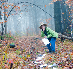 Woman laying a paper trail