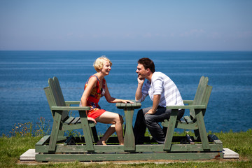 Romantic couple sitting on the bench