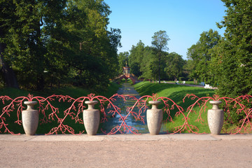 Bridge parapet from decorative vases and coral branches