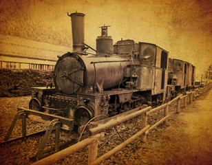 Obraz premium stary pociąg parowy na starym tle tekstury