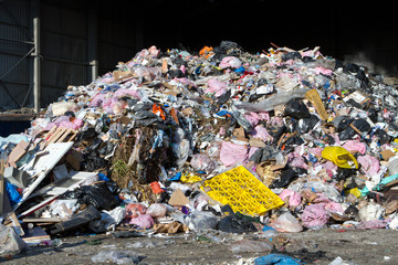 rubbish piled up at a waste management centre