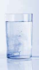 Fizzy tablet in a glass of water