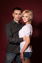 Happy couple in love having fun. Loving couple embracing.