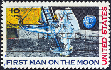 Naklejka premium Neil Armstrong setting foot on Moon (USA 1969)