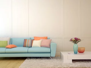 Foto op Aluminium Blue sofa with colorful pillows and a white coffee table © J.Zhuk