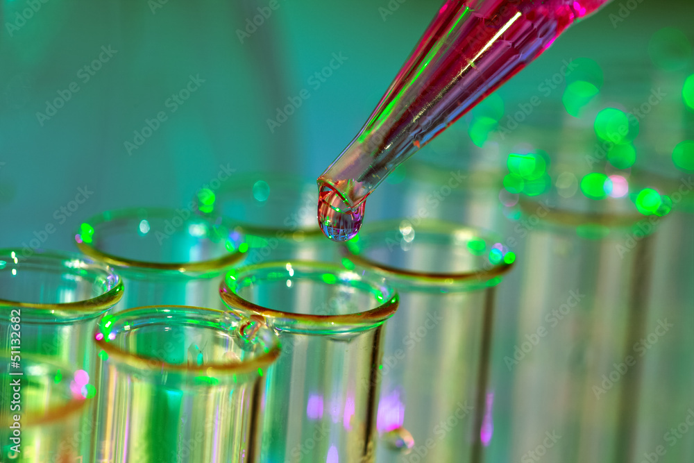 Wall mural pipette adding fluid to one of several test tubes