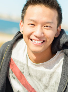 Portrait Of Happy Asian Man