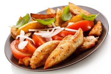 Grilled chicken breasts with cheese and baked potatoes