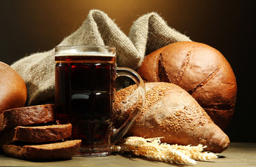 tankard of kvass and rye breads with ears,