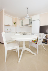 rustique white  kitchen with dinning table