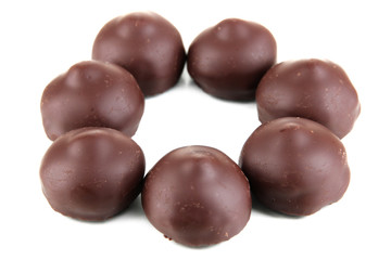 Chocolate candies isolated on white