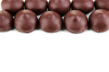 Chocolate candies isolated on white