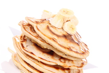 Pancakes with bananas and syrop