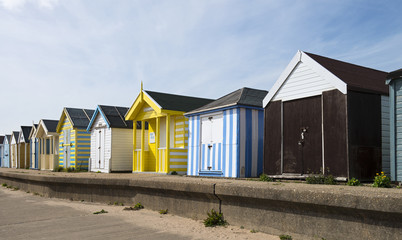 Fototapeta na wymiar Colorful Beach Huts at Chapel St Leonards, Lincolnshire, UK.
