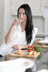 Woman preparing a meal in the kitchen