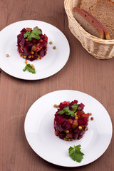 Salad with beetroot in a white plate