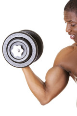 Muscular young man lifting weights