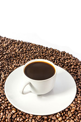 Coffee beans and coffee cup