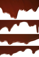 Melted chocolate dripping set on white background .