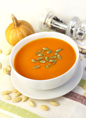 Pumpkin cream soup with pumpkin seeds