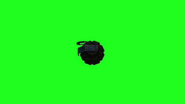 Granada de mano acercandose con fondo verde