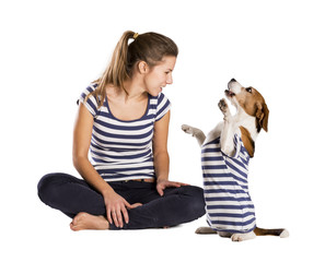 Dog and woman in studio