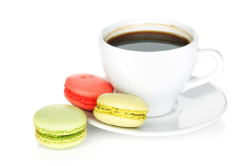 Colorful macaroons and coffee cup