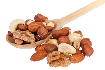 Nuts in a wooden spoon