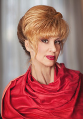Fototapeta premium Beautiful middle aged woman with makeup and hairstyle