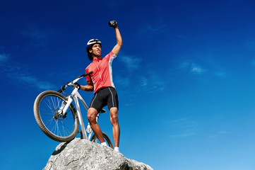 celebrating cyclist