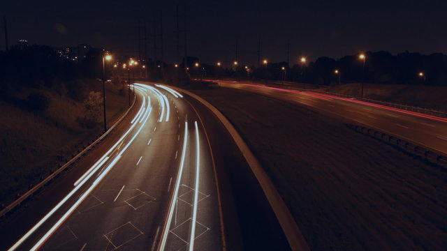 Highway corner. Timelapse at night. DVP in Toronto.