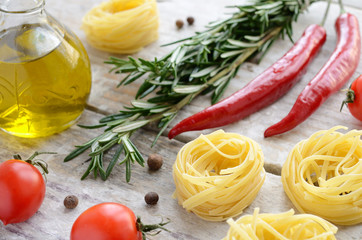 Raw tagliolini nest with tomatoes, rosemary, chilli and allspice