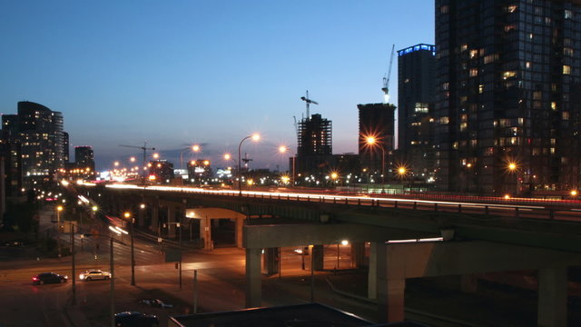 QEW highway in downtown Toronto. Dusk to night timelapse.