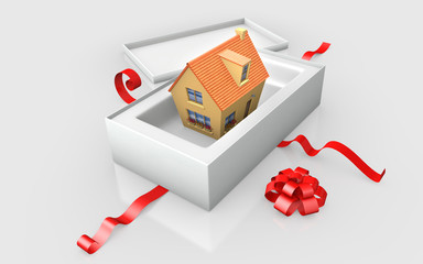 a house in a white cardboard box with red ribon