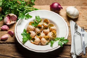 Homemade baked snails with garlic butter