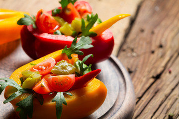 Closeup of vegetables salad in pepper bells