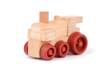 Toy steam locomotive on a white background