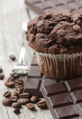 Chocolate muffin with dark chocolate, coffee beans