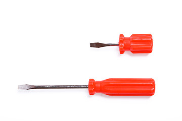 Two bright red screwdrivers isolated on white background