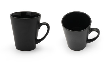 Two black mugs in different angles isolated on white