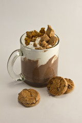 Hot chocolate with hazelnut cream and biscuits