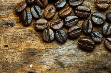 coffee bean ongrunge wooden background