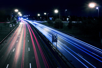 Fototapeta na wymiar Cars lights on London street by night