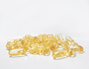 Shiny omega 3 pills on white background
